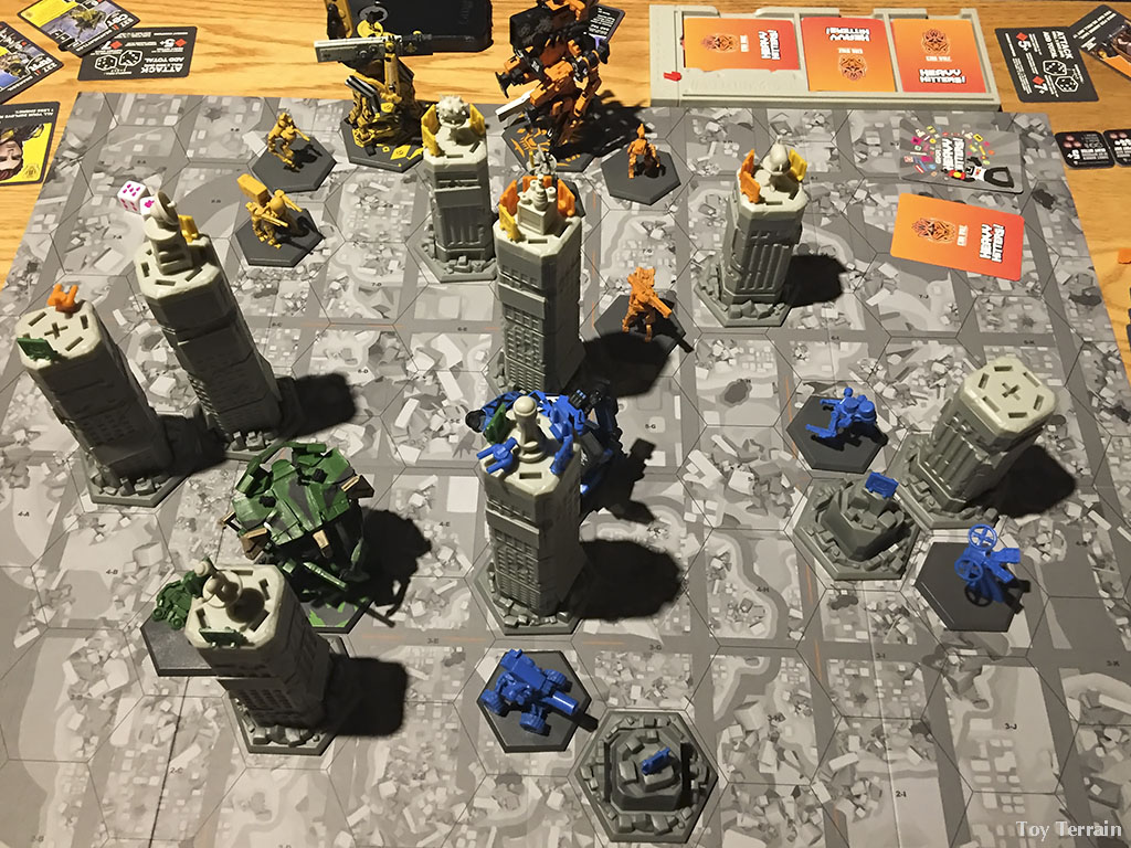 GKR Heavy Hitters game board with robots and buildings