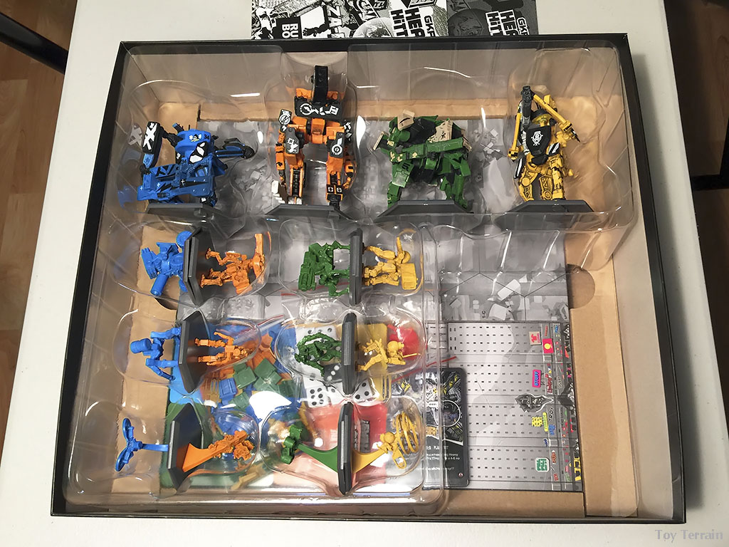 GKR Heavy Hitters Unboxing - view of the robots in the plastic form with game board visible in the bottom of the box